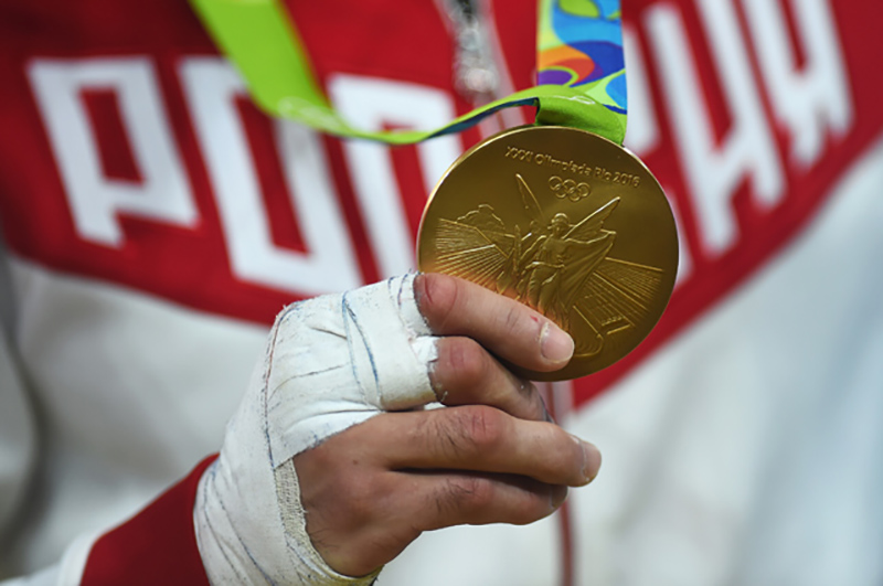 RIO DE JANEIRO, BRAZIL - AUGUST 06:  Gold medalist Beslan Mudranov of Russia shows his medal after the Men's -60 kg Judo competition on Day 1 of the Rio 2016 Olympic Games at Carioca Arena 2 on August 6, 2016 in Rio de Janeiro, Brazil.  (Photo by Laurence Griffiths/Getty Images)